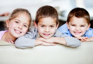 Three smiling children